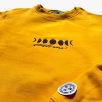 Sudadera All One Brand Moonphases Organic Embroidery Hoodie. Color: Mustard/Black
