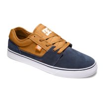 Zapatilla DC Shoes Tonik M. Color: Azul Marino/ Camello. 
 Características

 Parte Superior:Parte superior en cuero, ante, nobuk o textil (depende del color)

 Tejido interior de malla

 Construcción vulcanizada para sentir mejor la tabla y la flex